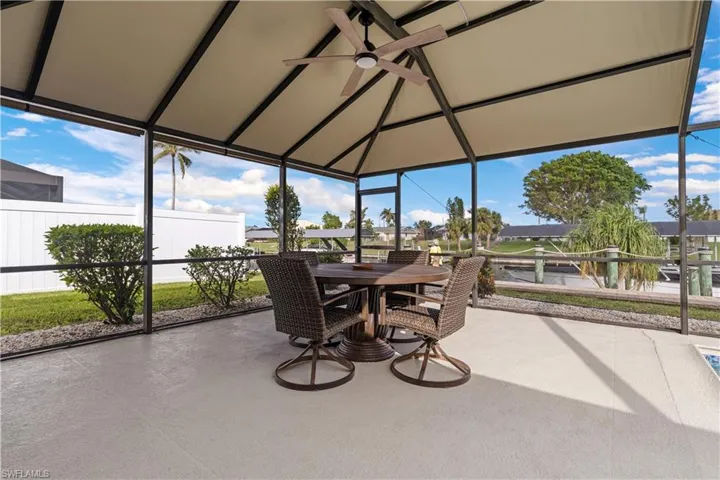 Covered extended lanai with vaulted ceiling and ceiling fan