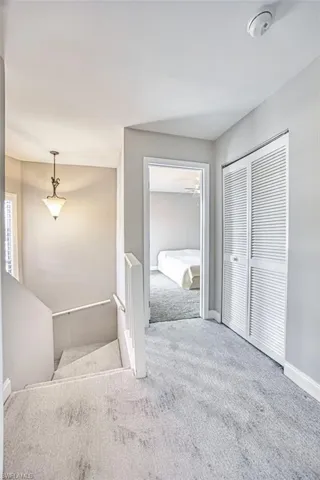 Bathroom with carpet flooring and connected bathroom