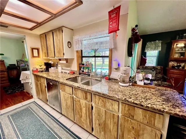 Kitchen with GRANITE tops and all appliances.