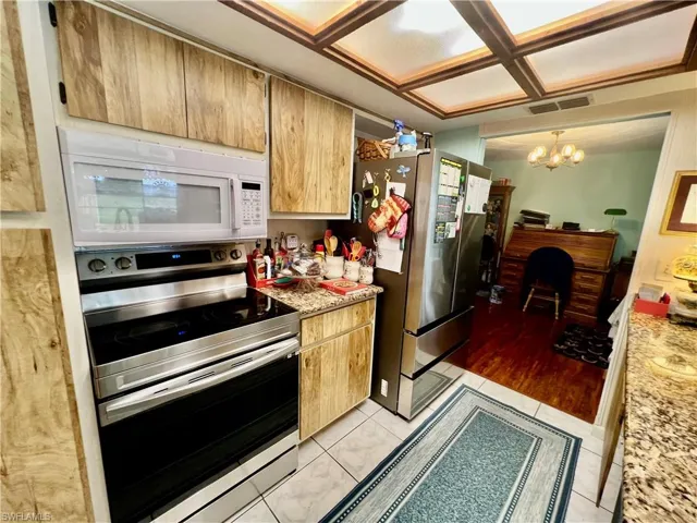 Kitchen with GRANITE tops and all appliances.