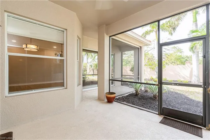 Screened lanai with view of backyard