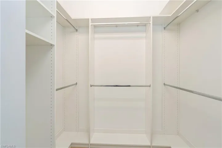 Owners' bedroom has 2 walk-in closets with built-ins