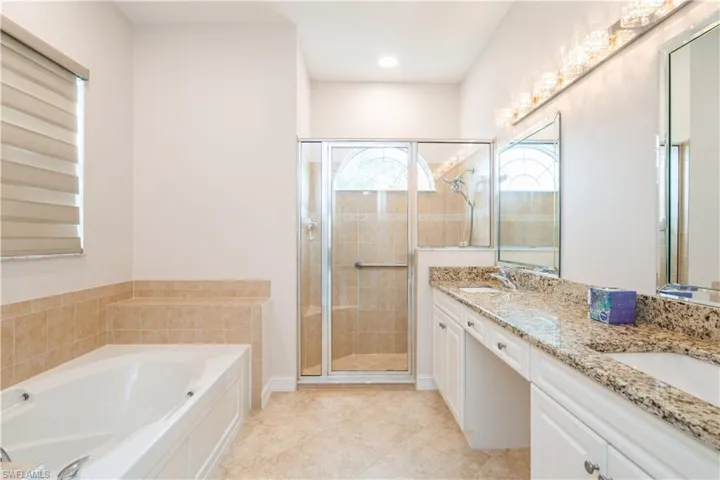 Soaker tub in owners' bathroom