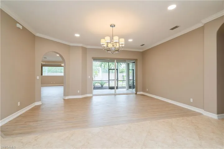 Formal living room with sliders to lanai