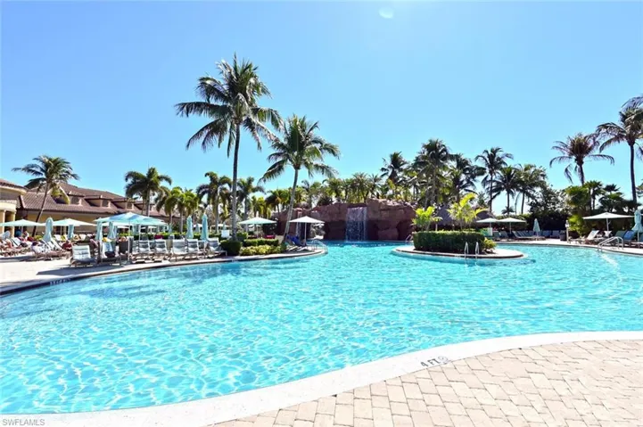 Community pool featuring a patio area