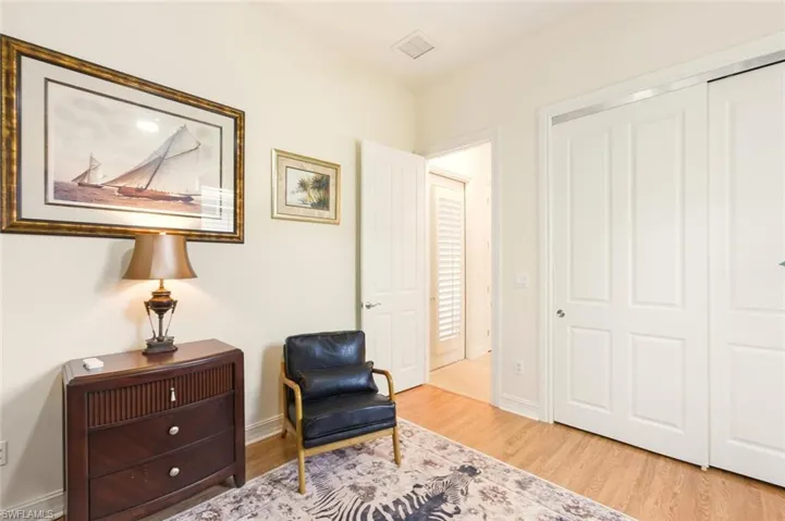Living area featuring wood finished floors and baseboards