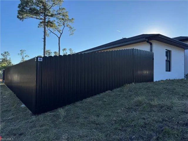 View of property exterior featuring stucco siding