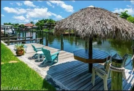 Dock with a water view and boat lift