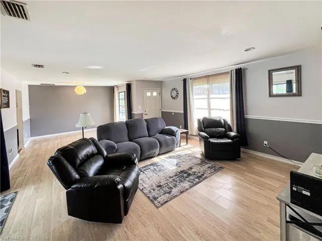 Living room featuring light wood-type flooring