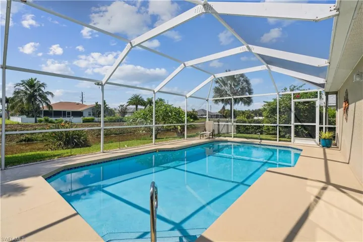 View of pool featuring a lanai and a patio area