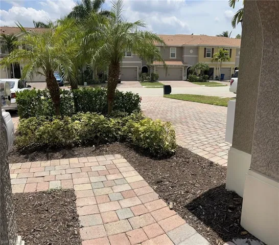 View of yard with a garage