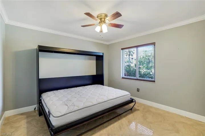 Updated tile, crown molding, Ceiling Fan & Window Blinds