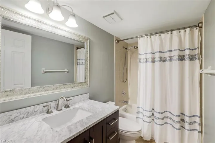 Guest Bathroom with New Vanity & Mirror with Shower/Tub Combo