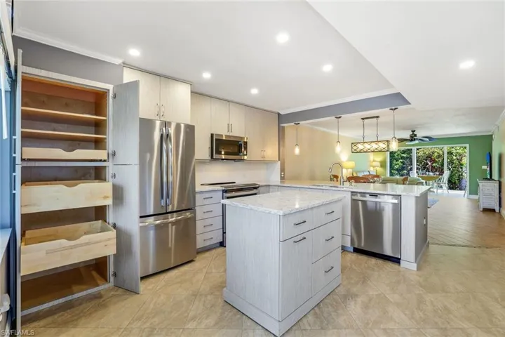 Fully Remodeled Kitchen-Custom Wood Cabinetry with Large Pantry & Pull-out Drawers