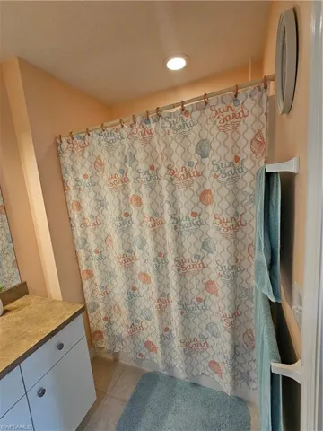 Bathroom featuring vanity and tile patterned floors