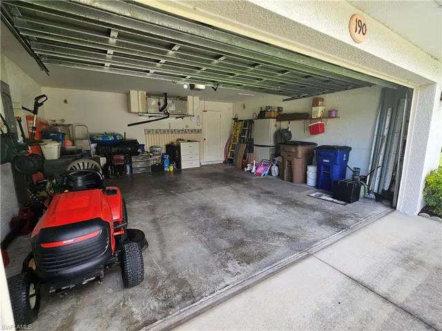 Garage featuring a workshop area