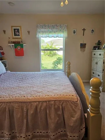 Bedroom with carpet flooring