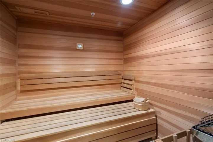 Relaxing sauna with wooden ceiling and wooden walls