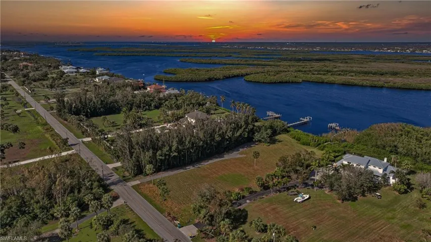Aerial view at dusk with a water view