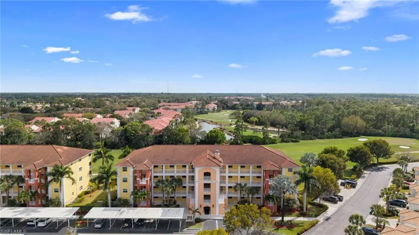 Aerial view of a nearby body of water and a local golf course