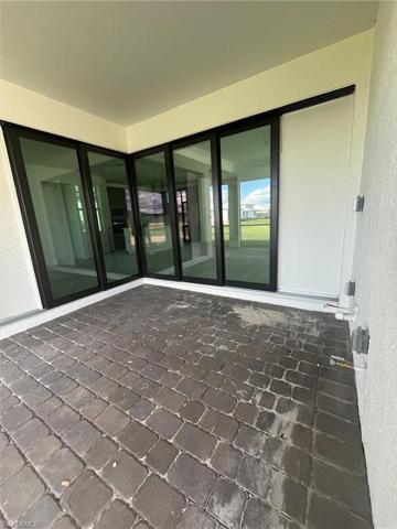 Inside extended covered lanai - zero corner sliding doors