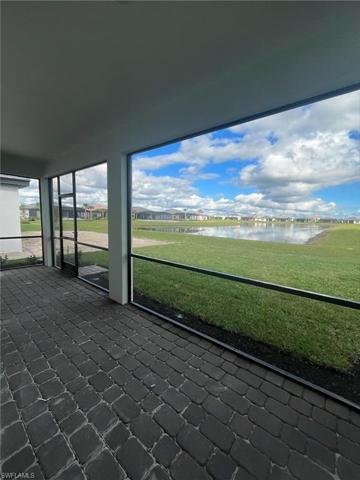View inside extended covered lanai - water view