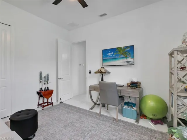Front Bedroom With Ceiling Fan