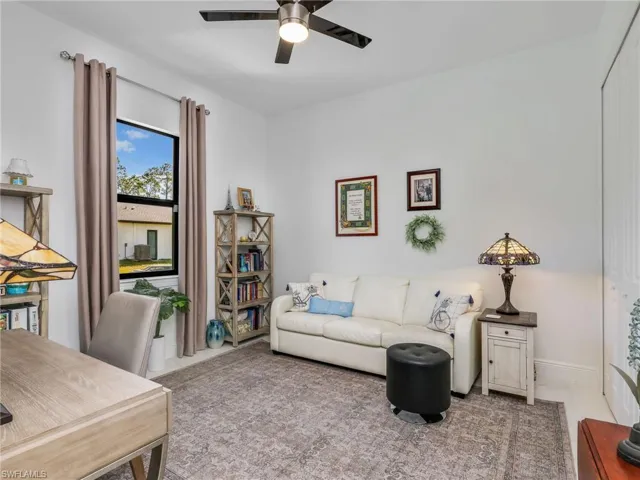 Front Bedroom With Ceiling Fan