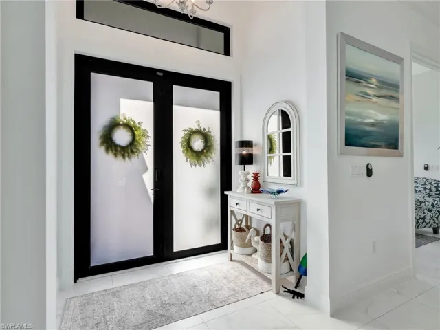 Front Entry With Double Glass Doors With Transom Window, & Den