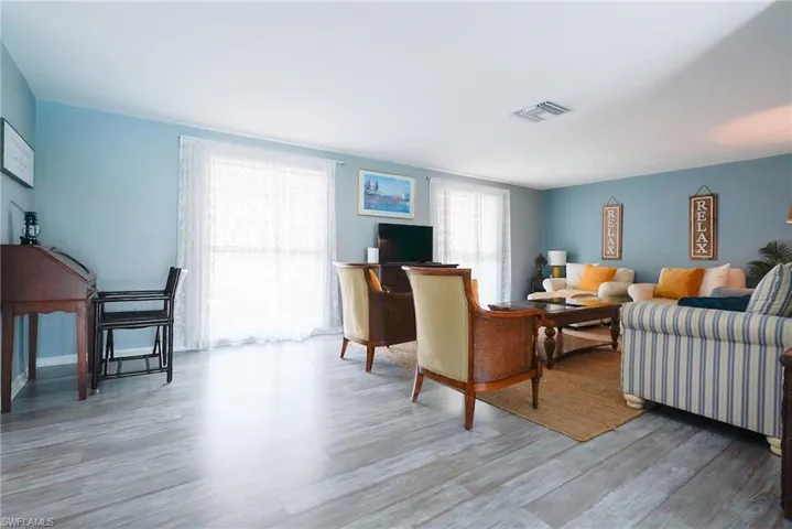 Living area with wood finished floors