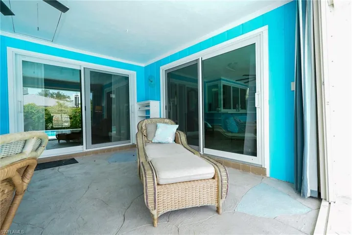 Balcony featuring ceiling fan
