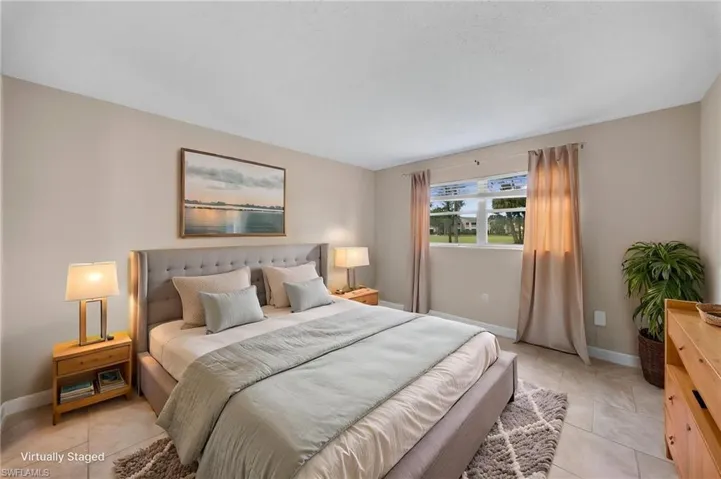 Bedroom with baseboards