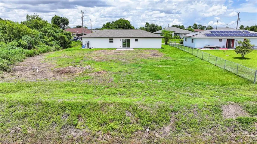 View of fenced backyard