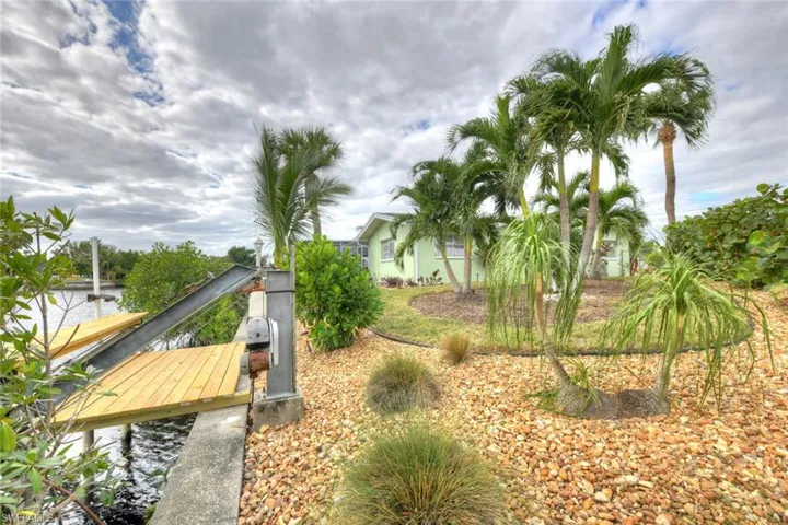 View of yard with a water view