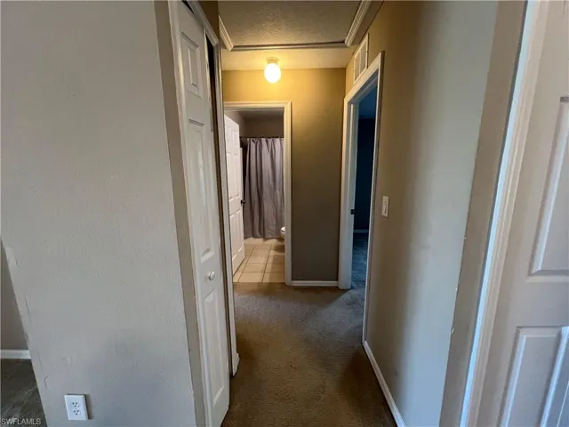 Hallway to guest bedrooms and bath