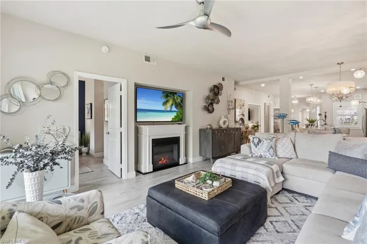 LIVING AREA...ENTRY INTO PRIMARY BEDROOM SUITE..HIGH CEILINGS!!