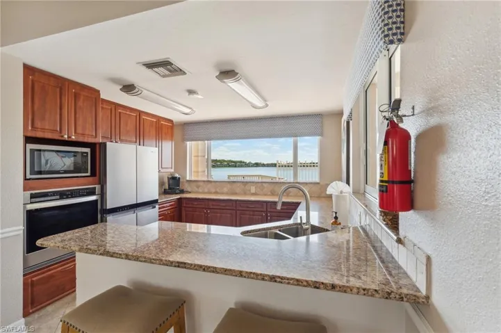 CROWN POINTE COMMUNITY CLUBHOUSE KITCHEN WITH BEAUTIFUL WATER VIEWS...CHECK OUT THIS WINDOW!!!!!