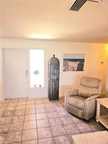 Entrance foyer with tile floors and lots of natural light