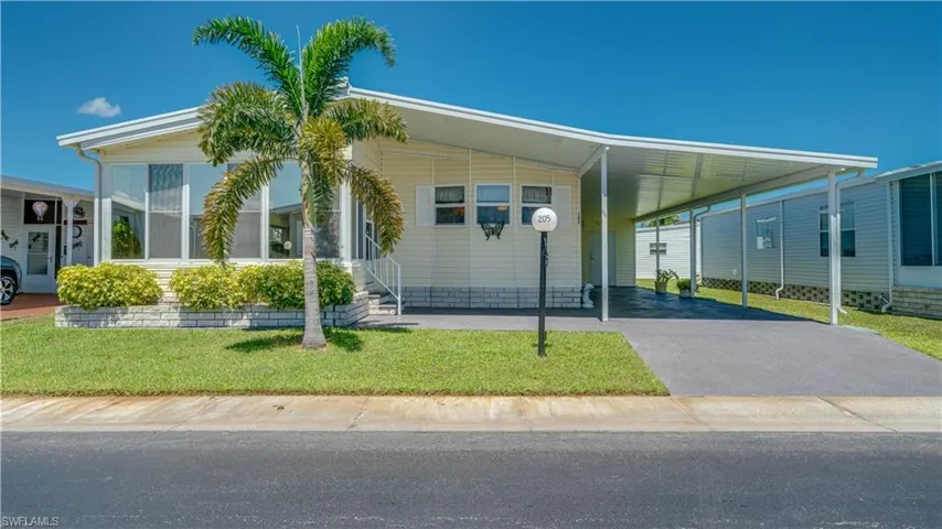 Notice the palm tree? Notice the quality windows? Yes; the blue skies go on and on!