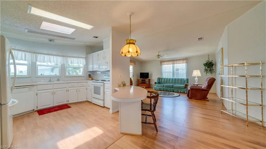 Back inside you'll take note of the open floor plan providing a healthy amount of Florida sunshine.
