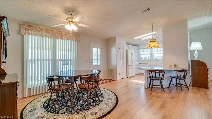 The dining room is expansive. The floor to ceiling window, quite unique.
