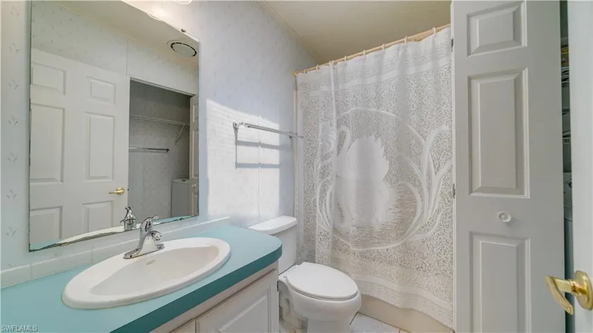 The second bathroom is just down the hall from the main living area. A tile floor? Of course!