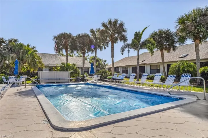 four buildings form a courtyard with a private pool.