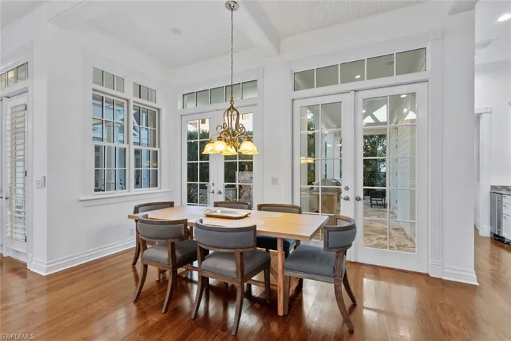 Family room dining area for easy indoor/outdoor dining with the French doors right by leading to the lanai!