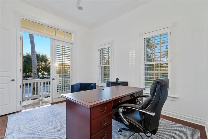 Corner Office/Den with beautiful light coming in and steps from the beach