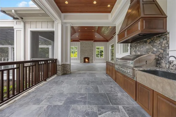 Patio with built-in kitchen and appliances