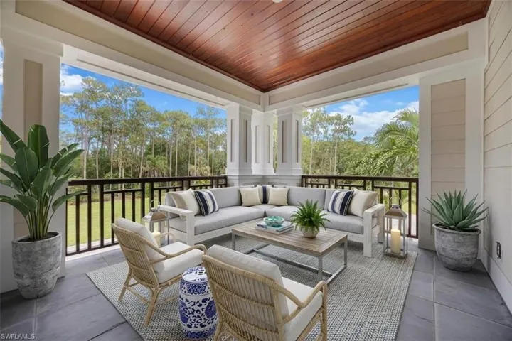 Virtually staged. 2nd floor lanai off of bedroom
