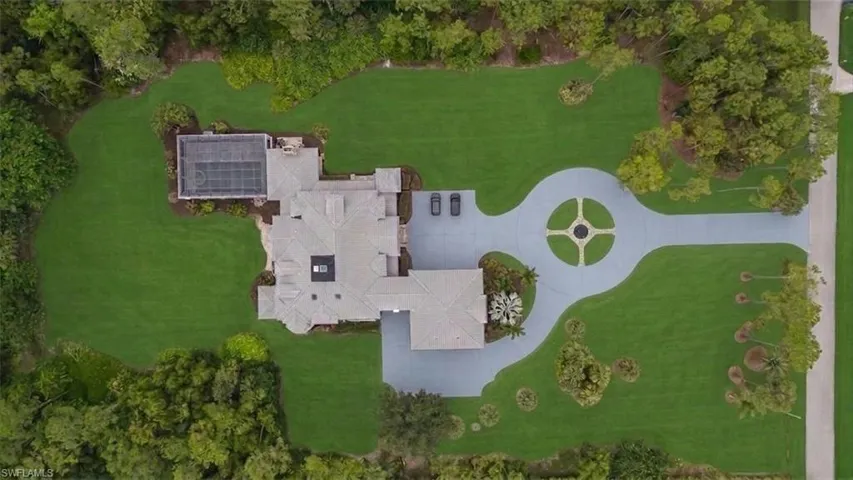 2263 Coach House Lane set on 5 acres close to downtown Naples