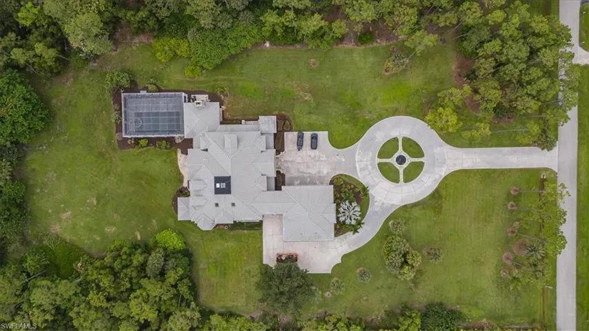 2263 Coach House Lane set on 5 acres close to downtown Naples
