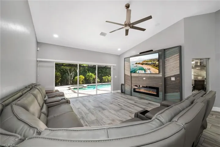 Open great room with oversized island and game area
